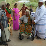 Wheelchair distribution at Welfare needs distribution camp in rural areas for leprosy beneficiaries